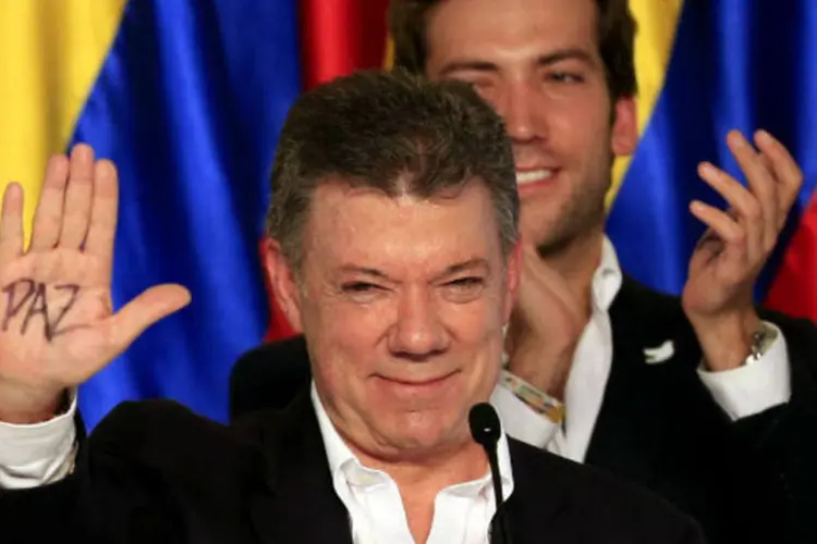 
	Juan Manuel Santos, presidente da Col&ocirc;mbia: &quot;isto me enche de confian&ccedil;a e de esperan&ccedil;a, vamos conseguir essa paz que foi t&atilde;o esquiva&quot;
 (REUTERS/Jose Miguel Gomez)