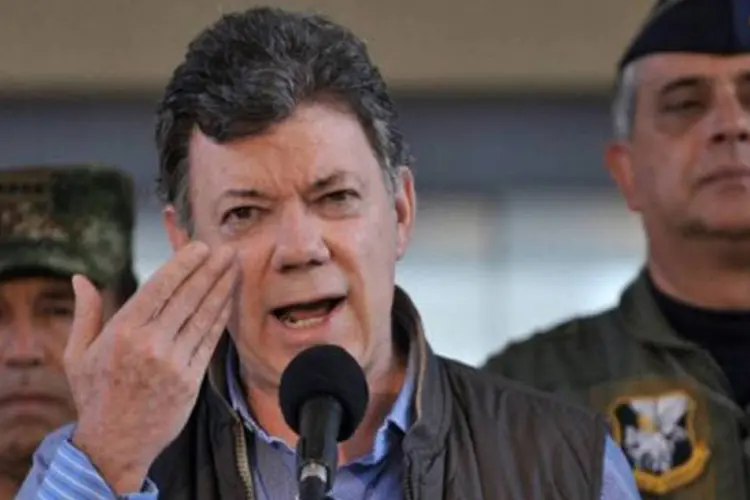 
	Santos: o presidente assinalou que as for&ccedil;as militares colombianas n&atilde;o suspender&atilde;o suas opera&ccedil;&otilde;es durante estes contatos com a guerrilha
 (Guillermo Legaria/AFP)