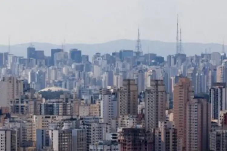 
	Vista a&eacute;rea de S&atilde;o Paulo: Segundo Credit Suisse, custo de terrenos e outorgas dever&aacute; subir 40% em m&eacute;dia
 (Yasuyoshi Chiba/AFP)