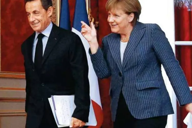 Sarkozy e Merkel: austeridade, austeridade e mais austeridade ( Patrick Kovarik/AFP Photo)