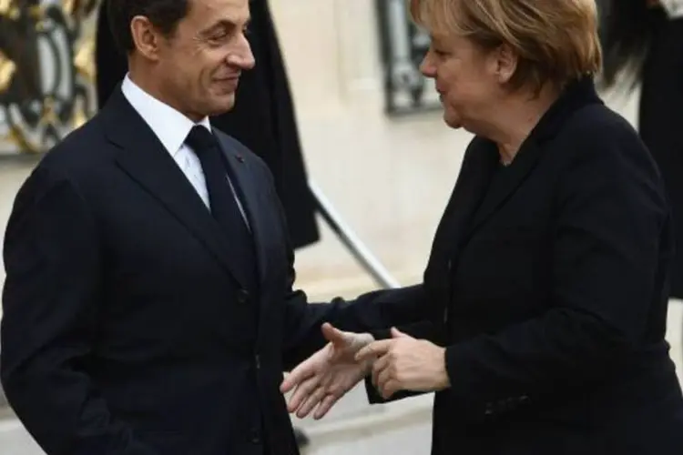 'Somos conscientes de que o crescimento e o emprego devem ser prioritários' na hora de resolver a crise que atinge a zona do euro, disse Sarkozy após encontro com Mekel (Julien M. Hekimian/Getty Images)