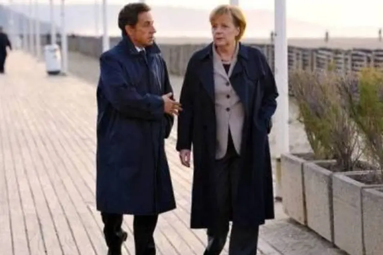 O presidente francês, Nicolas Sarkozy, e a chanceler alemã, Angela Merkel (Philippe Wojazer/AFP)
