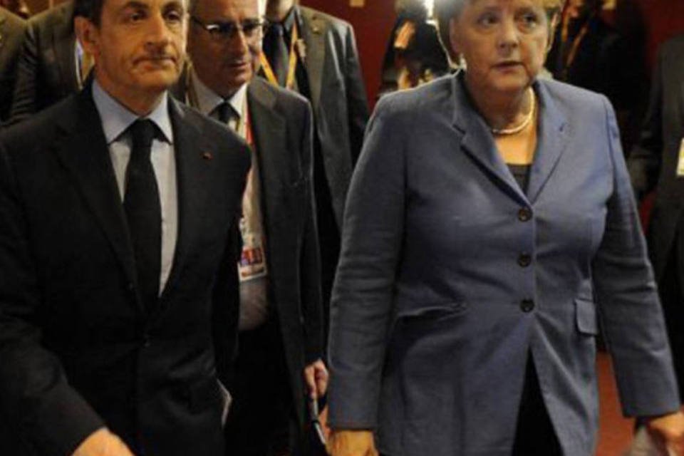 Merkel, Sarkozy e Lagarde discutem com bancos corte na dívida grega