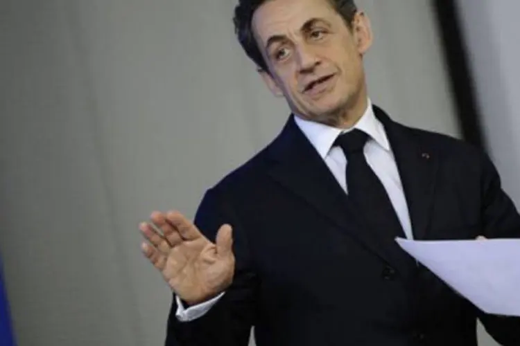 Sarkozy anunciou a retirada dos jornalistas franceses da Síria durante uma coletiva de imprensa em Bruxelas (©AFP / Lionel Bonaventure)