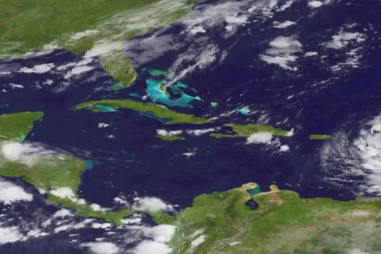 
	Imagem de sat&eacute;lite de 22 de agosto de 2012 mostra a forma&ccedil;&atilde;o da tempestade tropical Isaac
 (AFP)