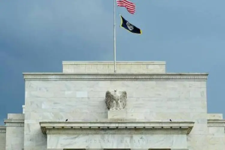 
	A sede da Federal Reserve: o banco central americano ressaltou que as atuais taxas de juros em n&iacute;veis excepcionalmente baixos &quot;seguem sendo apropriadas&quot;
 (Karen Bleier/AFP)
