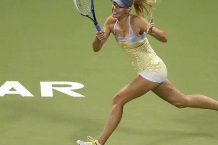 
	Maria Sharapova: a maior efici&ecirc;ncia da atual terceira colocada do ranking mundial no saque tamb&eacute;m ficou clara no n&uacute;mero de aces - foram 12
 (REUTERS/Fadi Al-Assaad)