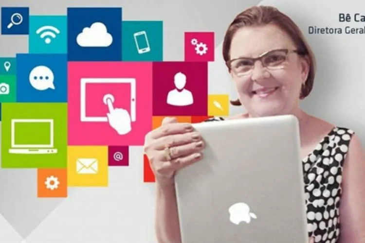 
	Siec: &uacute;nica imagem da campanha que continua no Facebook &eacute; da diretora geral segurando o MacBook
 (Reprodução/Facebook)