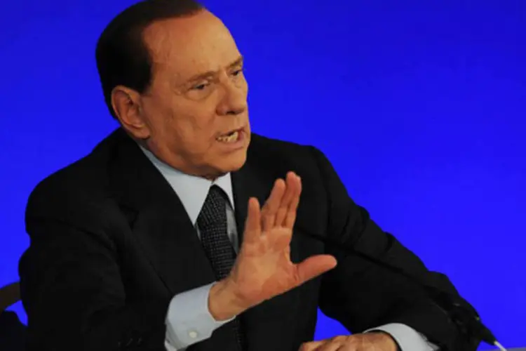 
	Silvio Berlusconi: com as datas das audi&ecirc;ncias fixadas, deduz-se que Berlusconi n&atilde;o vai sofrer a humilh&atilde;o de uma condena&ccedil;&atilde;o por prostitui&ccedil;&atilde;o em campanha eleitoral.
 (©afp.com / Pascal Guyot)
