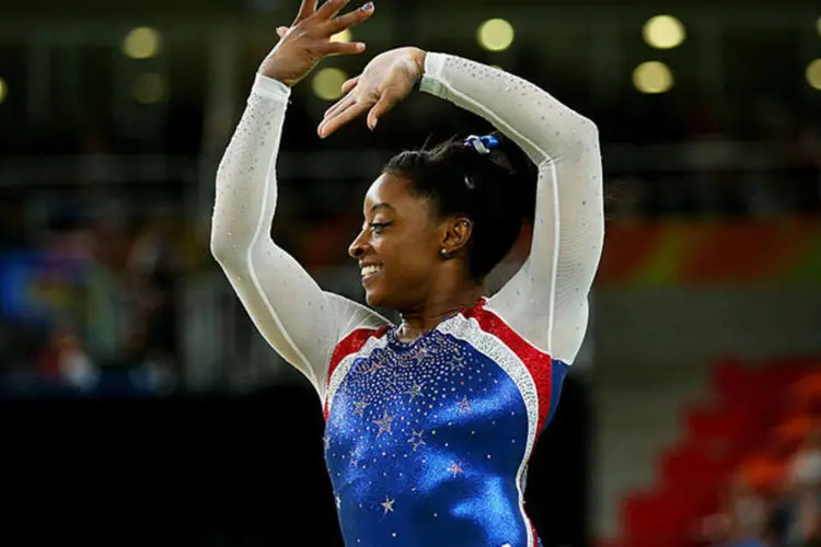 
	Simone Biles: atleta segue caminho para conquistar recorde de 1&ordf; a ganhar em uma mesma Olimp&iacute;ada 5 dos 6 t&iacute;tulos poss&iacute;veis
 (Alex Livesey/Getty Images)