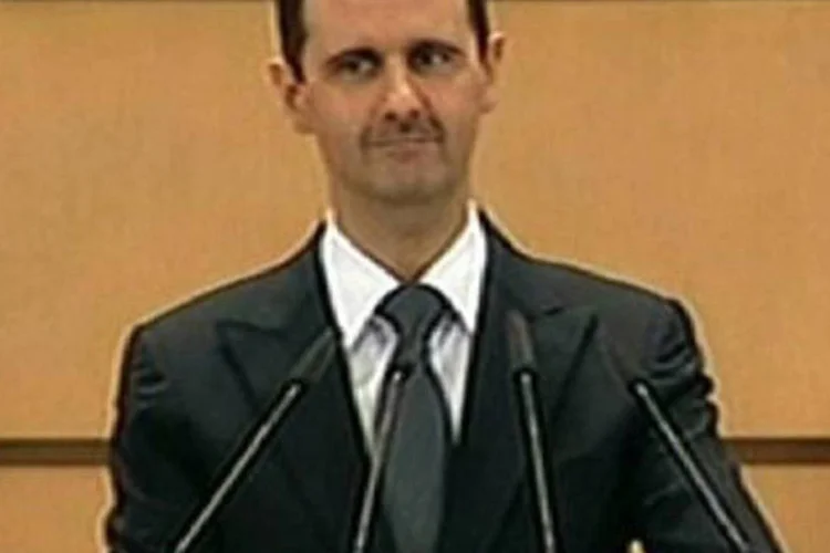 Assad: "o diálogo nacional pode gerar emendas à Constituição ou uma nova Constituição" (AFP)