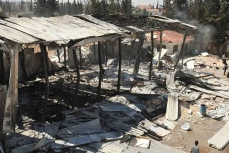 Ataque na quarta-feira contra o canal estatal sírio Al-Ikhbariya matou três jornalistas e quatro seguranças: violência na Síria já deixou 15 mil mortos (AFP)