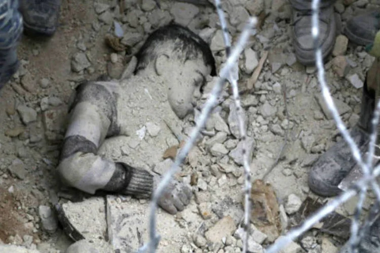 Mundo em guerra (REUTERS/Hosam Katan)