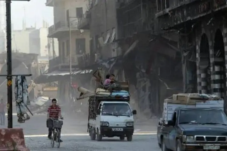 Sírios em Homs: desemprego chegou a 54,3% no último trimestre de 2013 (Joseph Eid/AFP)