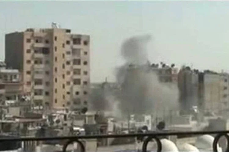 Homs bombardeada por exército regular: mais de 13.400 pessoas morreram na Síria desde o dia 15 de março de 2011, em sua maioria civis (AFP)