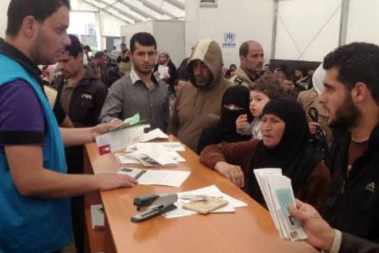 
	S&iacute;rios em centro de registro de refugiados da ONU em cidade do L&iacute;bano
 (Joseph Eid-AFP)