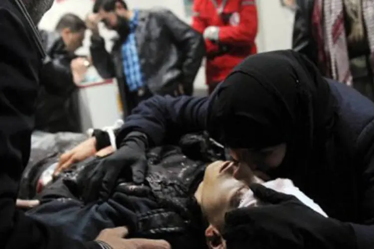 Mais de 500 crianças morreram desde o início da rebelião, em março de 2011, segundo a comissão
 (Bulent Kilic/AFP)