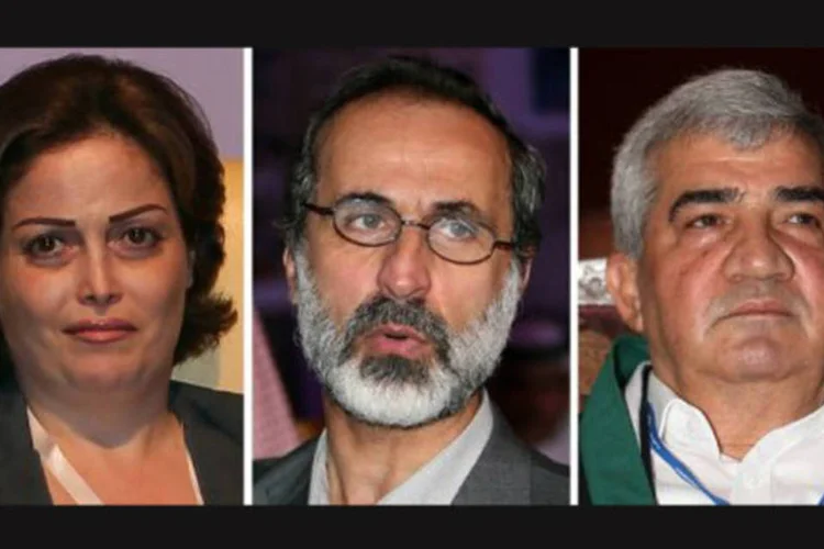 Suhair Atassi, Riad Seif e Moaz Al-Jatib, líderes da oposição síria
 (Karim Jaafar/AFP)
