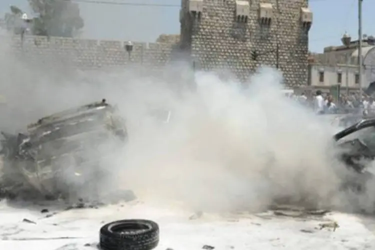Ataque ao Palácio de Justiça de Damasco foi um dos episódios de violência na quinta-feira
 (AFP)