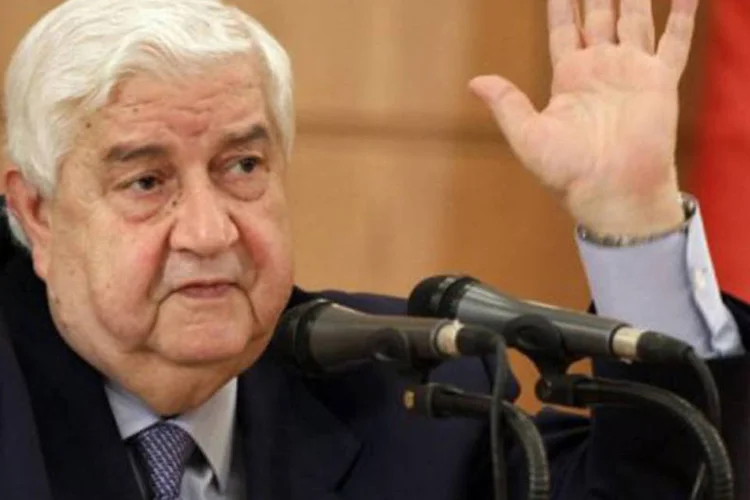 
	O ministro das Rela&ccedil;&otilde;es Exteriores s&iacute;rio, Walid al Muallem:&nbsp;avi&atilde;o no qual o ministro s&iacute;rio viajava ficou&nbsp;cinco horas retido em fun&ccedil;&atilde;o de embargo internacional
 (Louai Beshara/AFP)