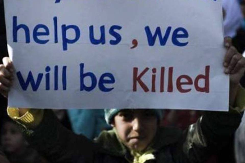 Testemunhas em Homs: 'Recolhemos corpos decapitados de crianças'