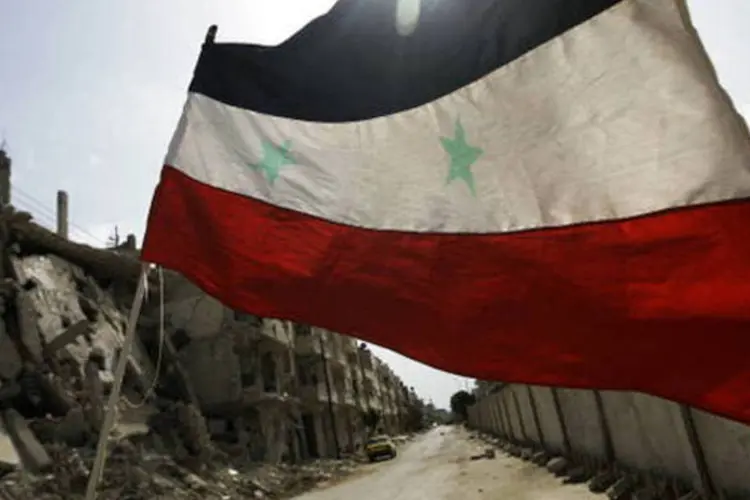 Bandeira da Síria: "O presidente continua normalmente com suas atividades e recebe conselhos. Não vemos sinais de cansaço, nem de estresse", diz empresário (Getty Images)