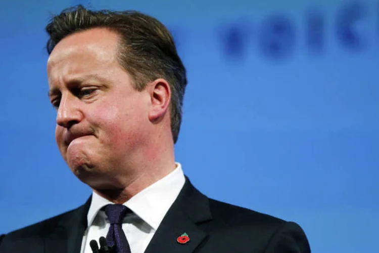 
	&quot;A situa&ccedil;&atilde;o &eacute; inaceit&aacute;vel. Pessoas tentam entrar ilegalmente no nosso pa&iacute;s&quot;, disse David Cameron
 (Suzanne Plunkett/Reuters)