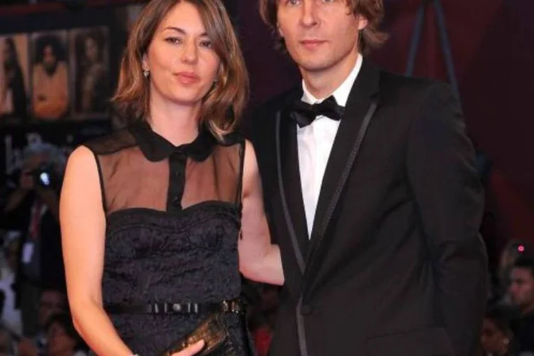 O casal vive em Paris há anos com suas duas filhas, Romy, de 4 anos, e Cosima, de 1 (Gareth Cattermole/Getty Images)