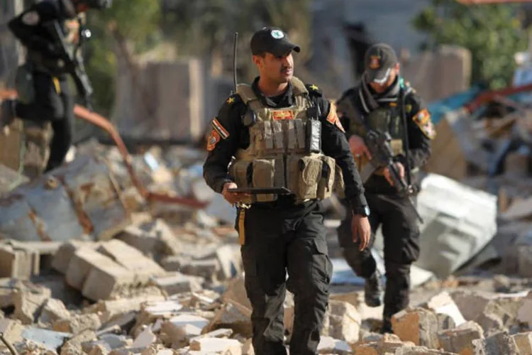 
	Iraque: essa alian&ccedil;a militar destruiu tamb&eacute;m com um m&iacute;ssil um ve&iacute;culo blindado carregado com explosivos que era conduzido por um suicida
 (Ahmad Al-rubaye / AFP)
