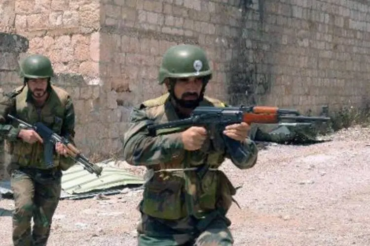 
	Soldados na prov&iacute;ncia de Aleppo: as for&ccedil;as do governo responderam com um violento contra-ataque e reconquistaram v&aacute;rias posi&ccedil;&otilde;es
 (AFP)