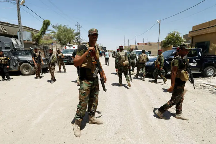 
	Iraque: a fonte acrescentou que as For&ccedil;as de Seguran&ccedil;a iraquianas e homens armados dos cl&atilde;s abortaram uma ofensiva do EI na zona Al Ratba
 (Reuters)
