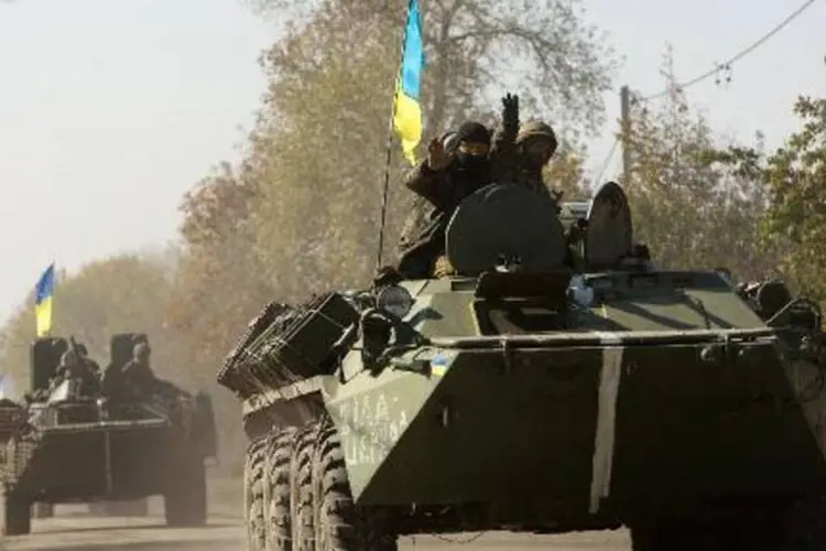 
	Soldados ucranianos em Donetsk: correspondentes ouviram disparos de lan&ccedil;a-foguetes
 (Anatolii Boiko/AFP)
