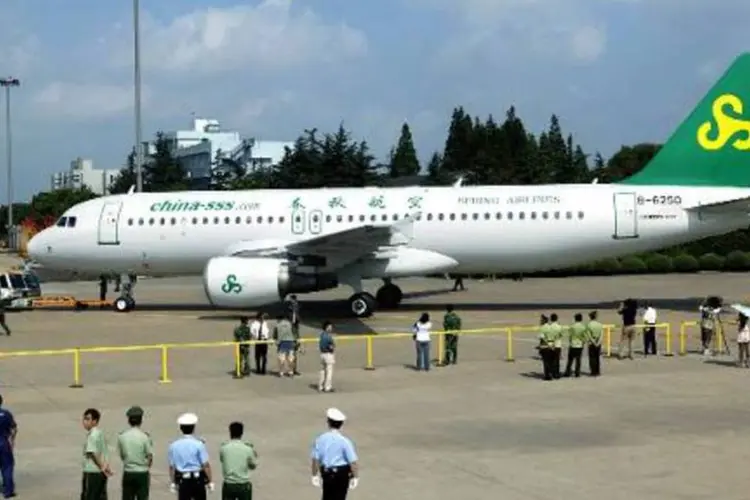 Avião da Spring Airlines: funcionários se negaram a deixá-los embarcar no avião (AFP)