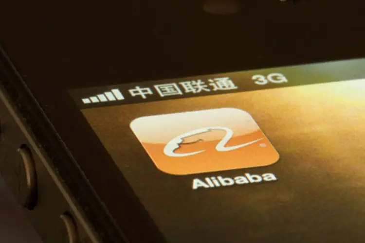 
	Celular com aplicativo do Alibaba: brasileiros tamb&eacute;m fazem parte da conquista dessa marca
 (Nelson Ching/Bloomberg)