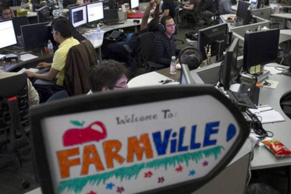 Funcionários da Zynga trabalham no estúdio de FarmVille na nova sede da companhia em São Francisco, Califórnia (David Paul Morris/Bloomberg)