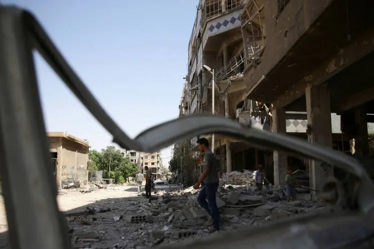 
	Bombardeios: na segunda-feira passada, os insurgentes lan&ccedil;aram uma ofensiva no norte de Hama.
 (Bassam Khabieh/Reuters)