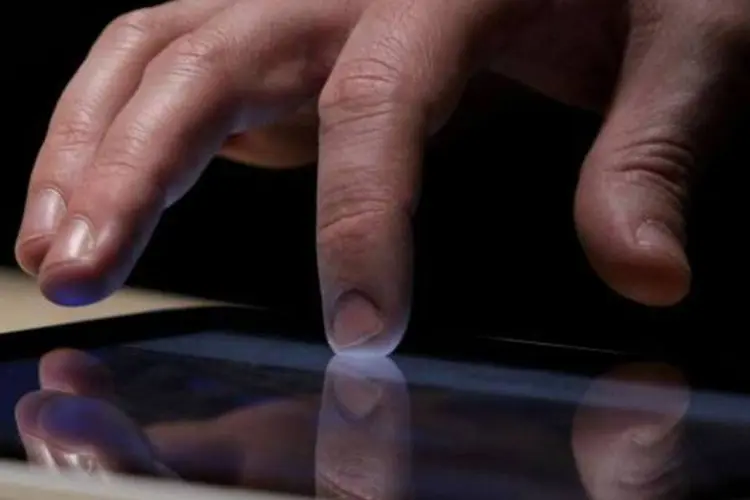 Os tablets são computadores portáteis, em forma de prancheta, com tela fina e sensível ao toque (Justin Sullivan/Getty Images)