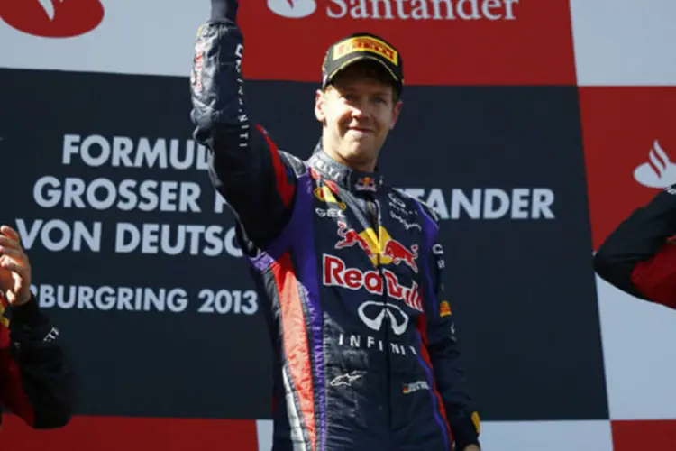 
	Piloto da Red Bull, Sebastian Vettel, comemora vit&oacute;ria no Grande Pr&ecirc;mio da Alemanha de 2013: piloto pode garantir seu quarto t&iacute;tulo consecutivo em Nova Deli&nbsp;
 (Kai Pfaffenbach/Reuters)