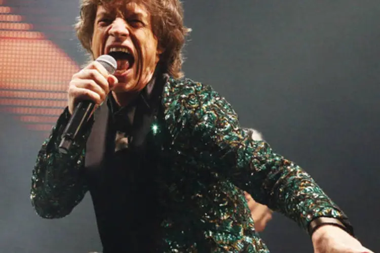Mick Jagger: septuagenário, cheio de rugas e pai de sete filhos, Jagger é uma das figuras mais veneradas do rock e sopra velinhas com uma forma física que já resistiu aos abusos de álcool e drogas de sua juventude (Olivia Harris/Reuters)
