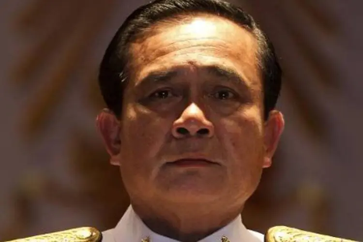 
	Chefe do ex&eacute;rcito tailand&ecirc;s, Prayut Chan-O-Cha: a lei permitia que militares detivessem ou levassem pessoas a tribunais, censuva os meios de comunica&ccedil;&atilde;o e proibia reuni&otilde;es pol&iacute;ticas de mais de cinco pessoas
 (Reuters/ PORNCHAI KITTIWONGSAKUL)