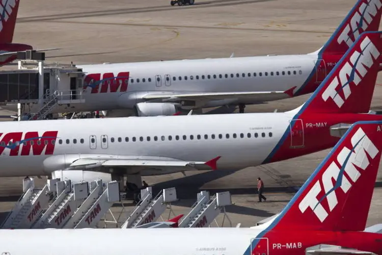 
	Avi&otilde;es da TAM: a companhia vai operar 97 voos extras, o que corresponde &agrave; oferta de mais de 15 mil assentos adicionais
 (Bloomberg)