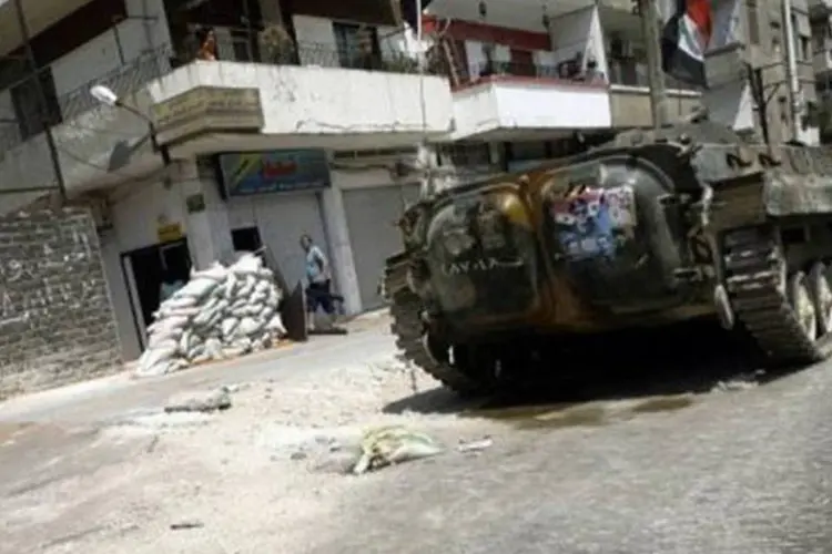 Grupo opositor Comitês de Coordenação Local aumentou a 23 o número de pessoas mortas neste domingo pela repressão das forças sírias em um dia de greve geral realizada na maior parte das províncias do país (Joseph Eid/AFP)