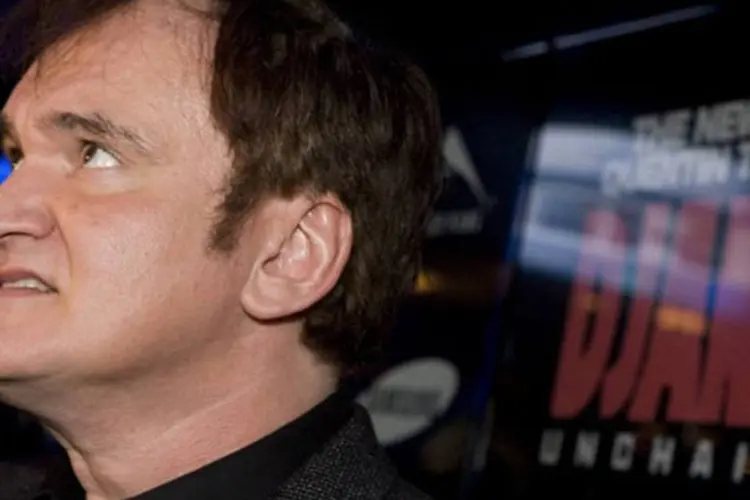 
	O diretor Quentin Tarantino: cineasta pede por mais de 1 milh&atilde;o de d&oacute;lares em danos em duas den&uacute;ncias de quebra de direitos autorais
 (Jack Boland/AFP)