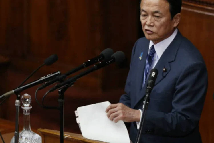 
	Taro Aso:&nbsp;&nbsp;&quot;Outros pa&iacute;ses que t&ecirc;m uma pol&iacute;tica de metas de infla&ccedil;&atilde;o tamb&eacute;m usam o CPI de pre&ccedil;os de alimentos e energia como guia de pol&iacute;tica monet&aacute;ria&quot;, afirmou o ministro
 (REUTERS/Issei Kato)
