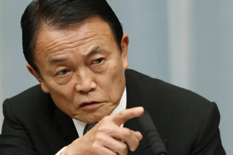 
	Ministro das Finan&ccedil;as do Jap&atilde;o, Taro Aso: o Federal Reserve deixou a taxa de juros inalterada na quinta-feira
 (Kim Kyung-Hoon/Reuters)