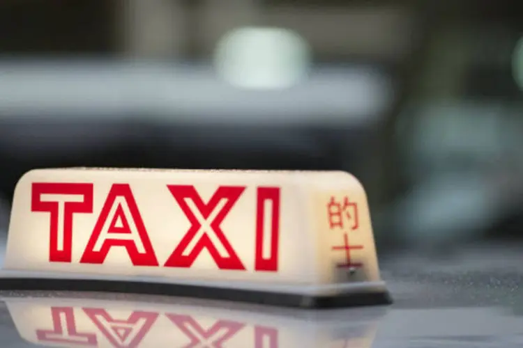 
	Taxi: apenas seis companhias de t&aacute;xi por r&aacute;dio devidamente registradas teriam permiss&atilde;o para operar em Nova D&eacute;lhi
 (Jerome Favre/Bloomberg)