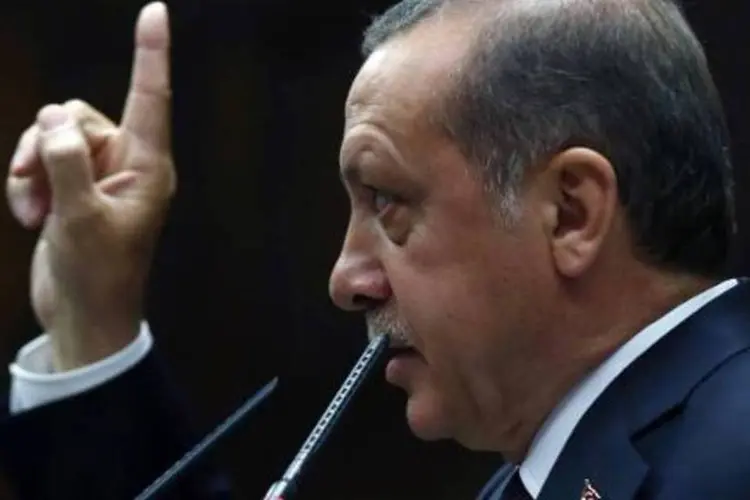 
	Recep Tayyp Erdogan: &quot;Misturar a minha fam&iacute;lia neste assunto &eacute; uma coisa muito imoral que antes a televis&atilde;o iraniana j&aacute; fez&quot;
 (Adem Altan/AFP)