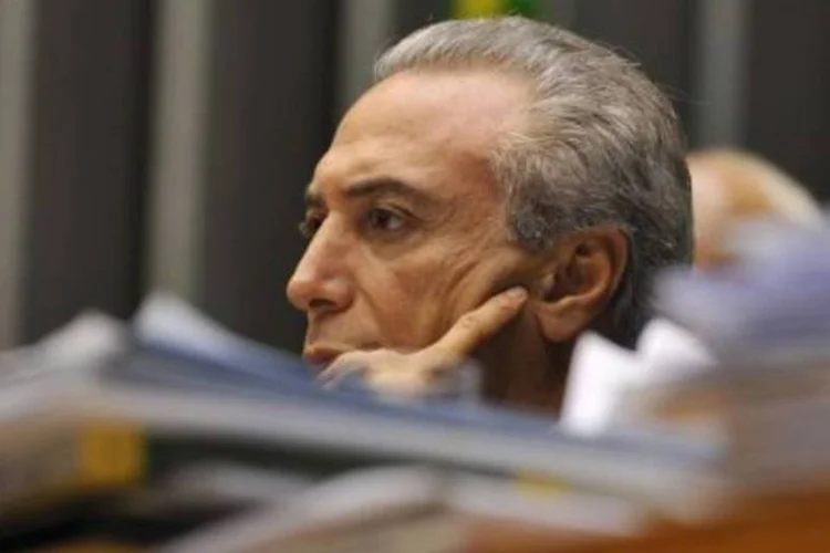 Michel Temer, presidente do PMDB, é cotado para ser o vice na chapa de Dilma. (.)
