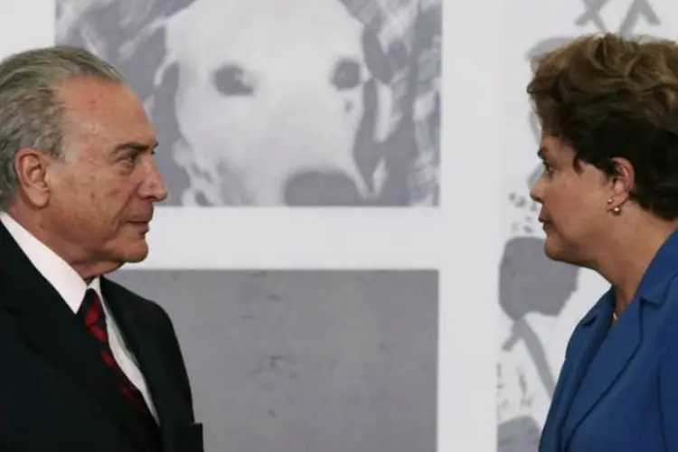 
	Presidente Dilma Rousseff e vice-presidente Michel Temer durante cerim&ocirc;nia no Pal&aacute;cio do Planalto, em Bras&iacute;lia
 (Ueslei Marcelino/Reuters)