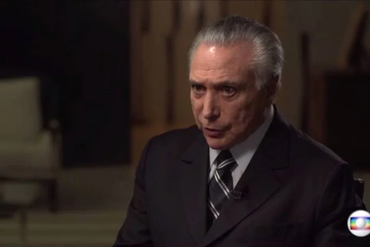 
	O presidente interino Michel Temer em entrevista ao Fant&aacute;stico: &quot;Estou negando a possibilidade de uma eventual reelei&ccedil;&atilde;o, at&eacute; porque isso me d&aacute; maior tranquilidade&quot;.
 (Reprodução/TV Globo)